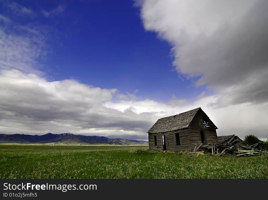 Old Homestead In Field