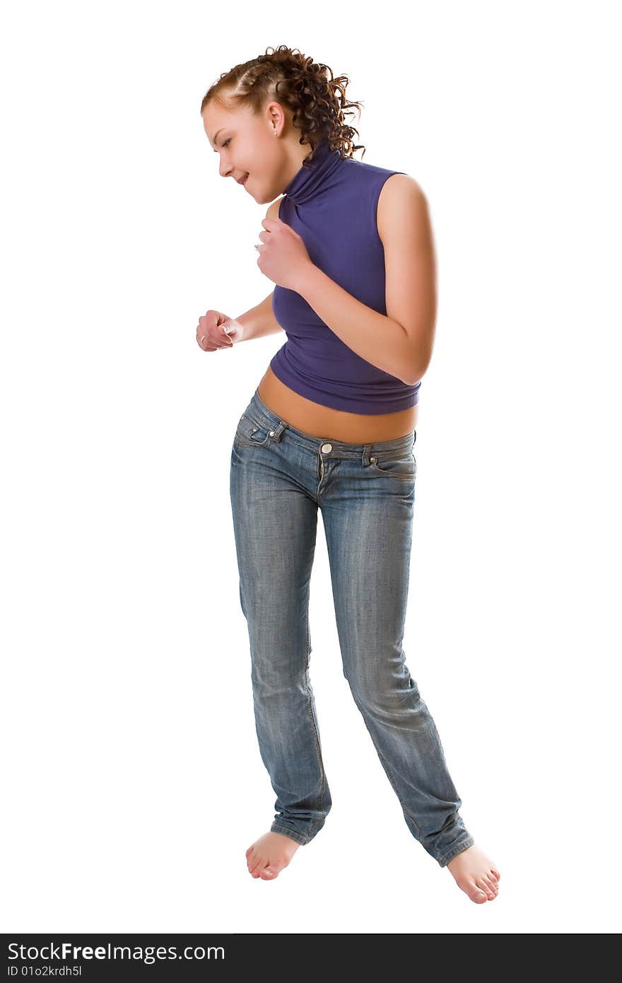 Beautiful girl dances isolated on a white background