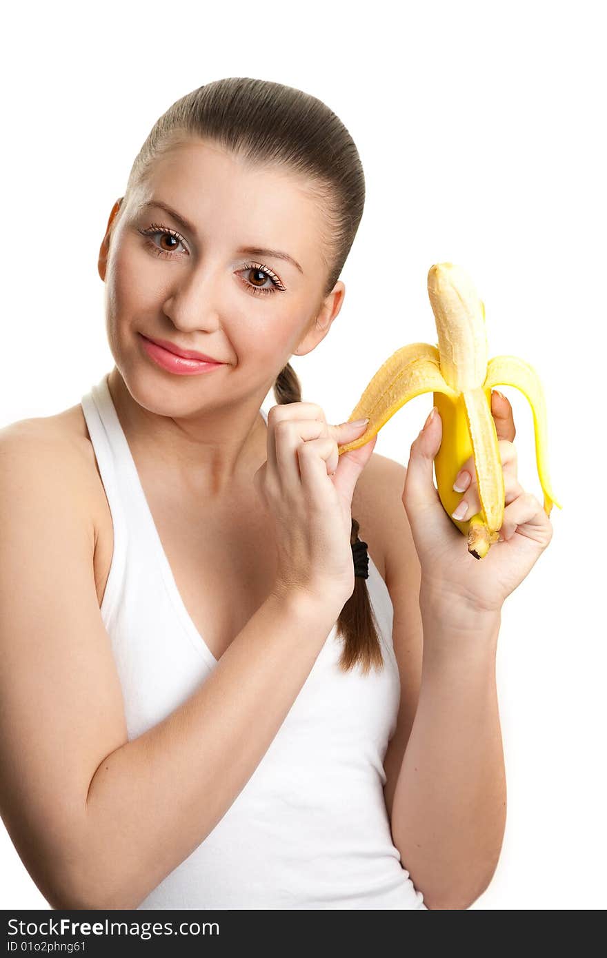 Beautiful girl with  banana studio shot