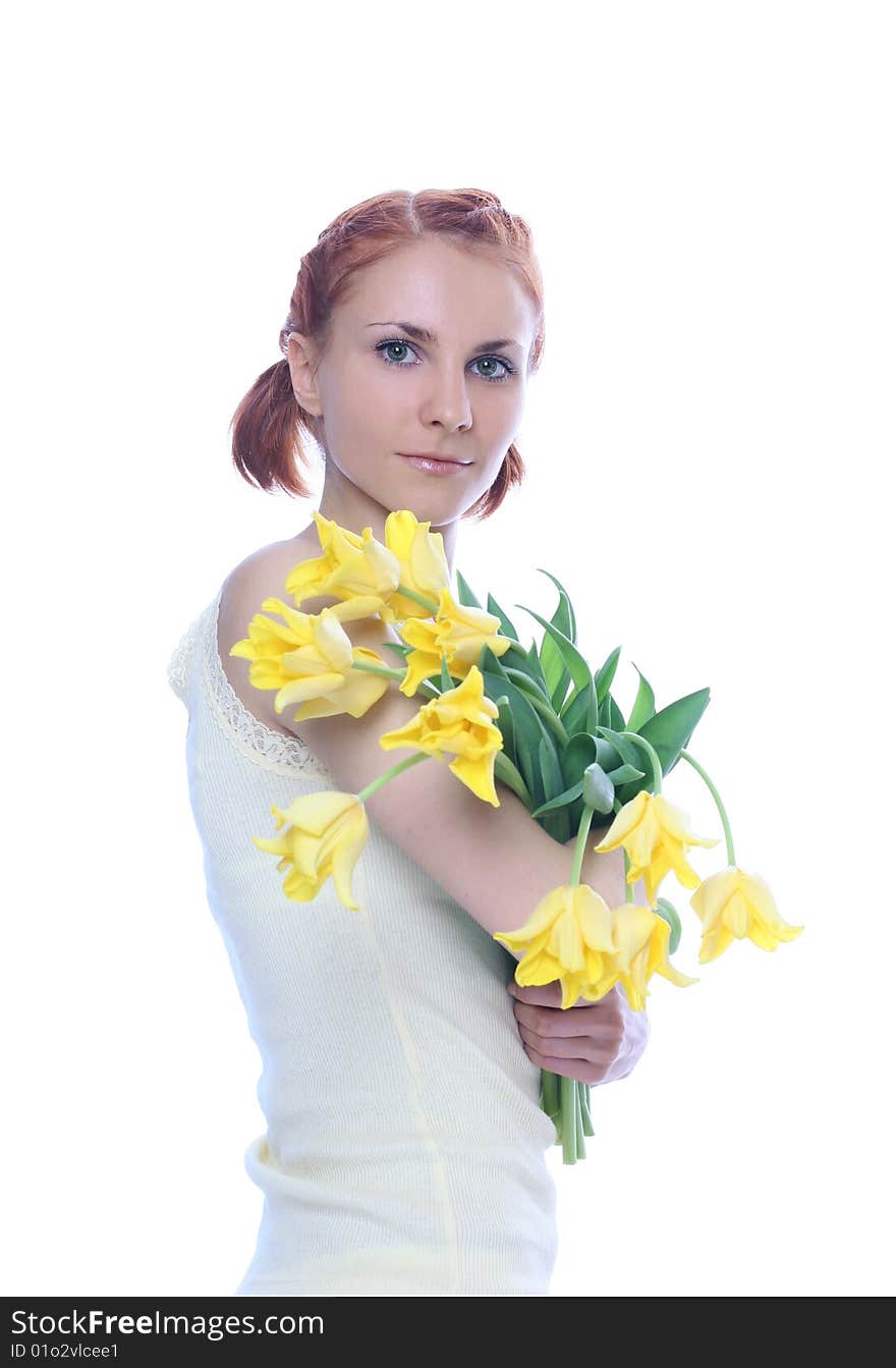 Cute young woman with yellow tulips. Cute young woman with yellow tulips