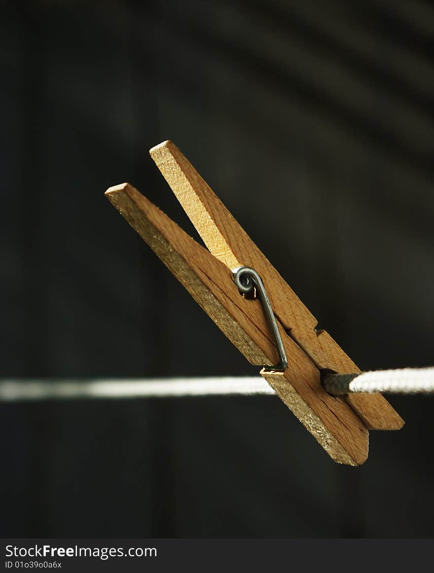 Wooden Clothespin on the String