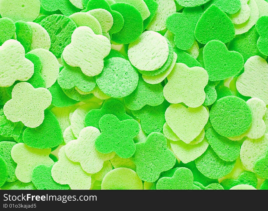 The background of green figurines. The background of green figurines