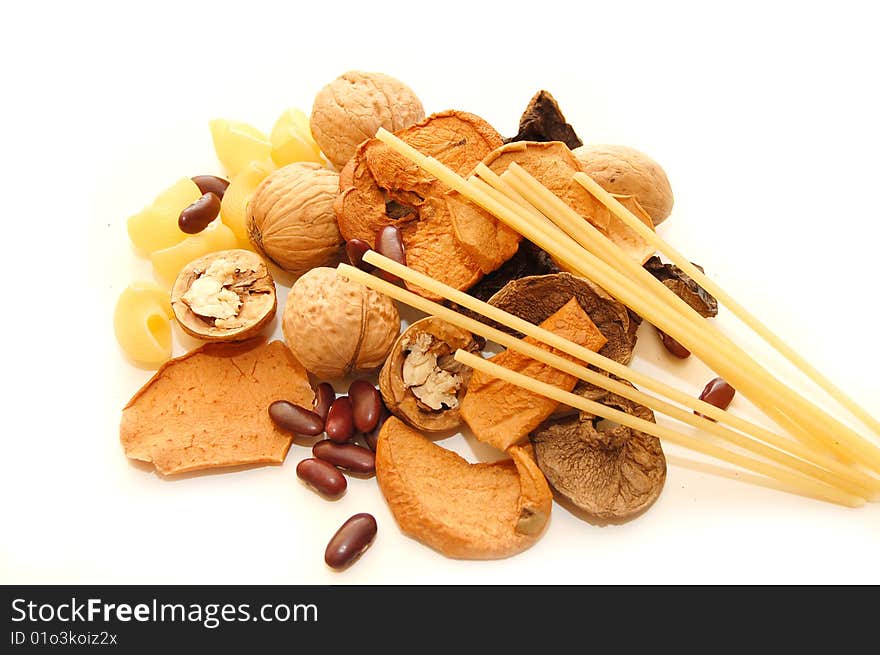 Mixed dried fruits on white background