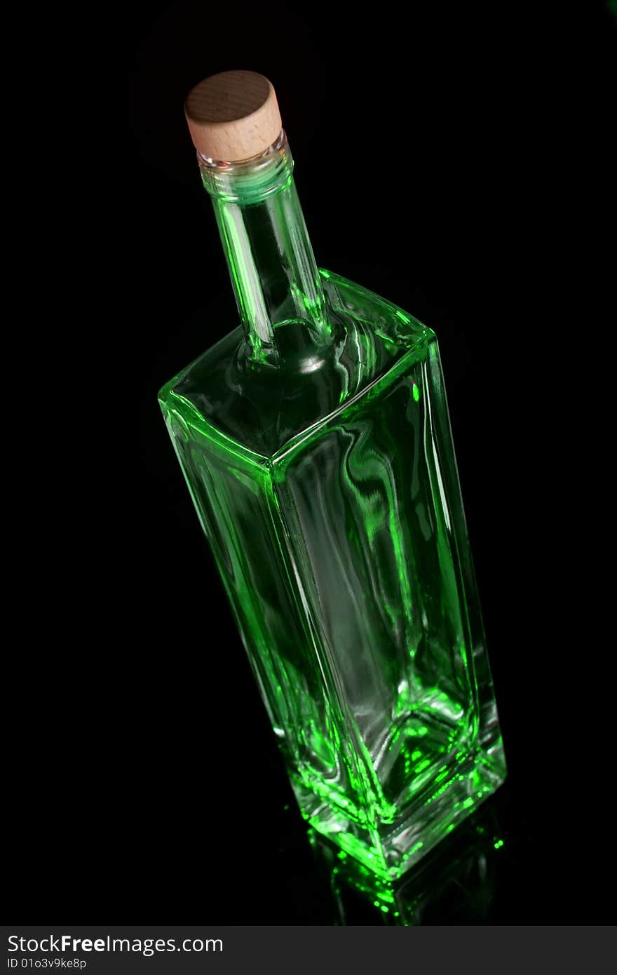 Green bottle with black backgroung