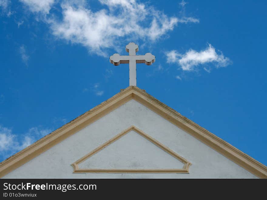 Church cross on a summer blue sky