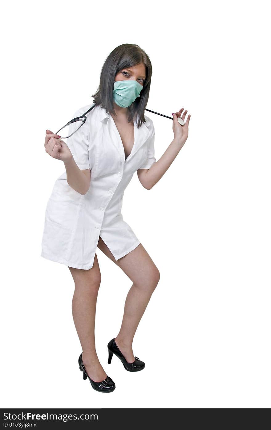 Doctor with mask and stethoscope posing. Doctor with mask and stethoscope posing