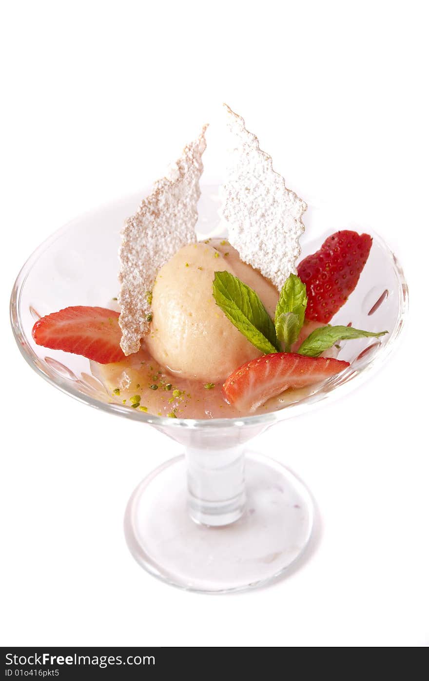 Gourmet ice cream in a bowl with strawberry isolated