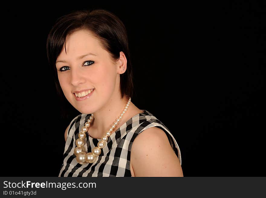 Pretty teenage woman on black background. Pretty teenage woman on black background