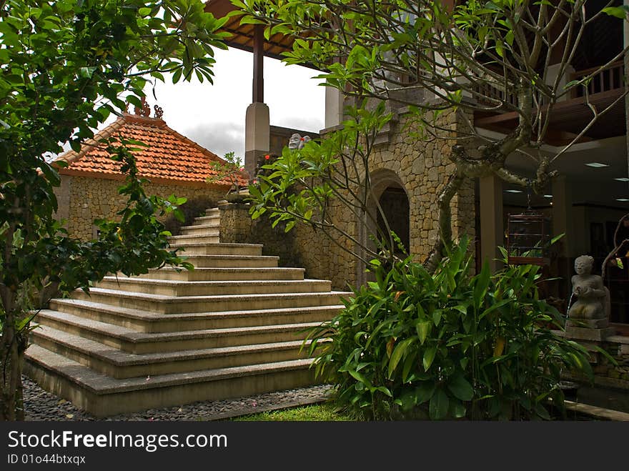 Balinese traditional architecture with god*s statue. Balinese traditional architecture with god*s statue