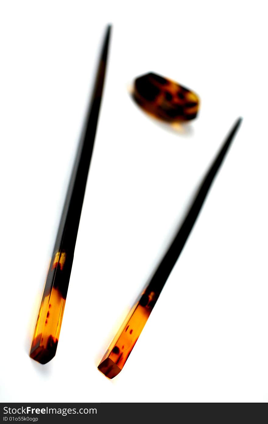 Chopsticks and stand of amber  for eastern food