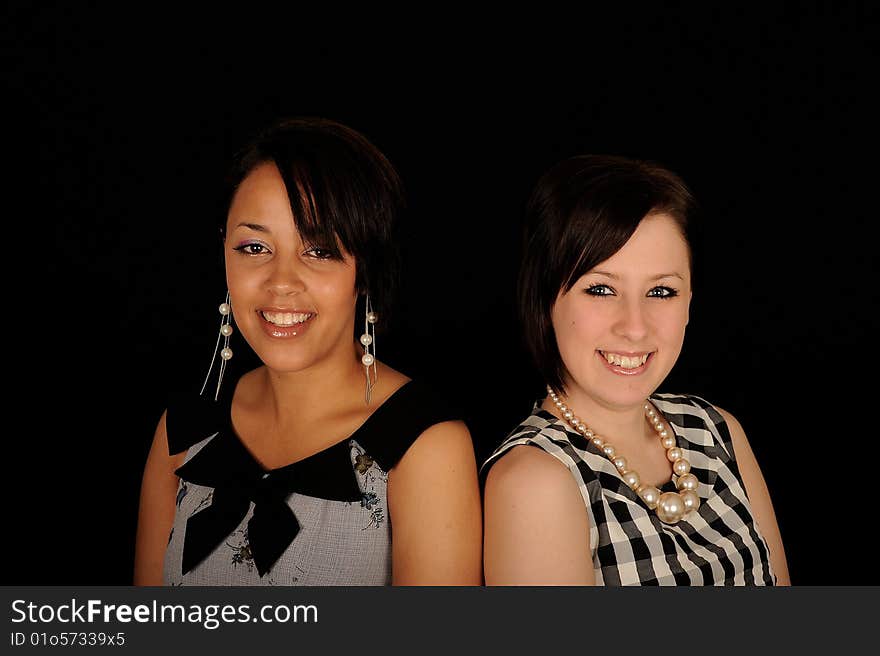 Pretty teenage women on black background. Pretty teenage women on black background