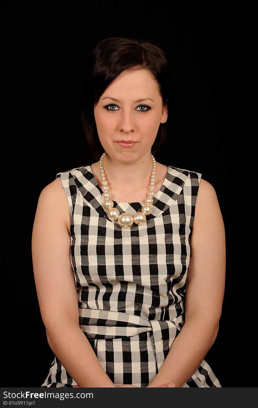 Pretty teenage woman on black background. Pretty teenage woman on black background