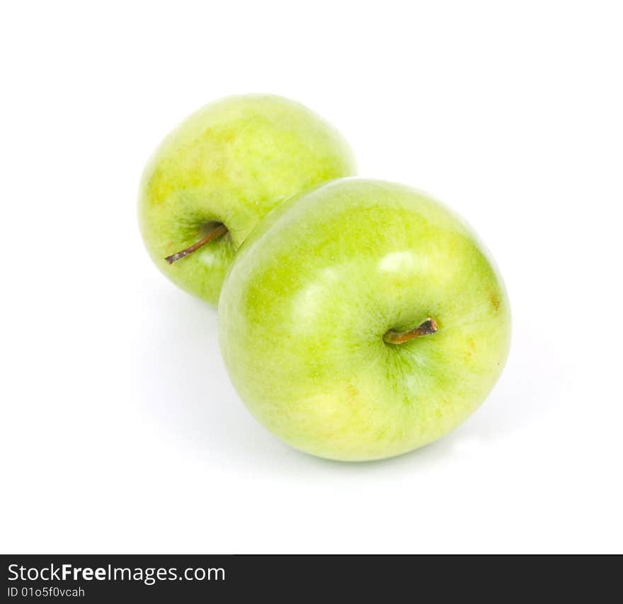 Green apples on white background