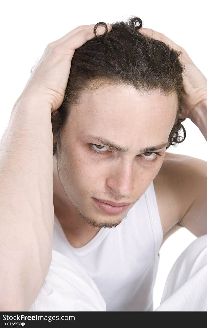 Tired young man in white