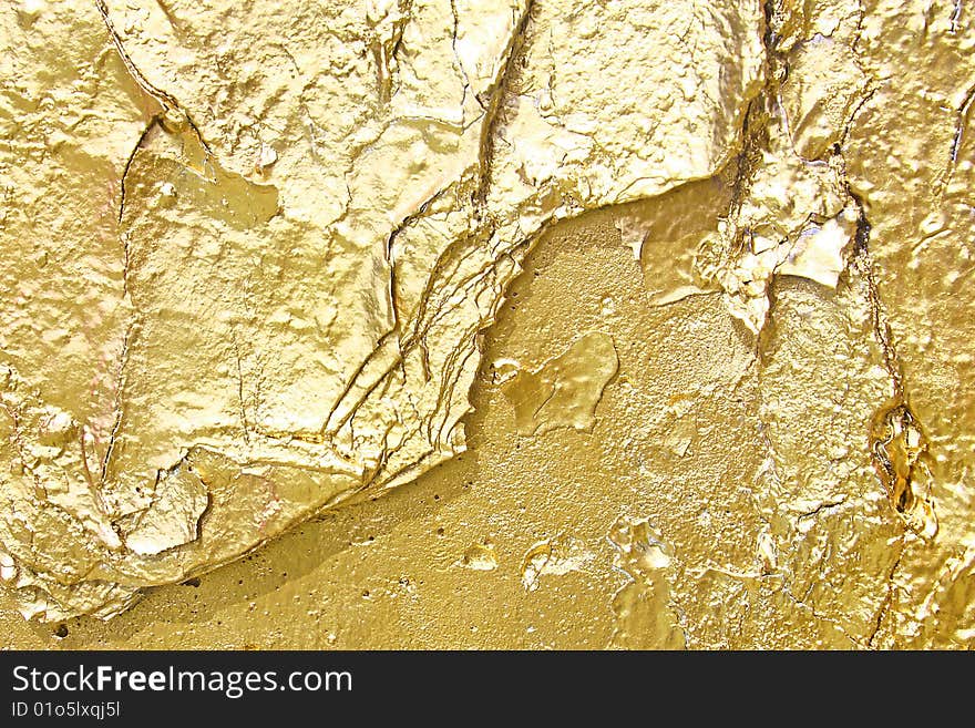 Photo of golden metal with lots of texture. Photo of golden metal with lots of texture