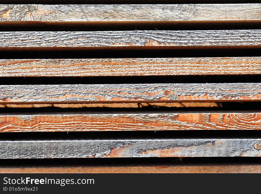 Abstract patterns of wooden boards at a sawmill