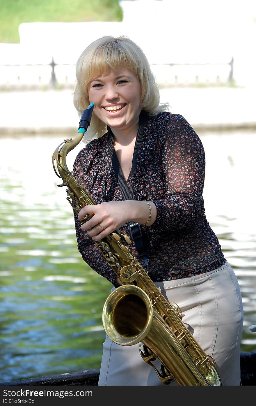 Girl Portrait With Saxophone