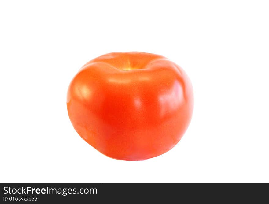 The red tomato on a white background, is isolated.