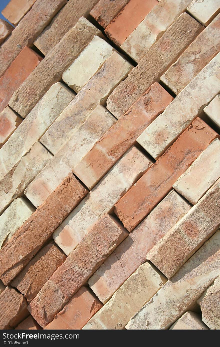 Pile of bricks on the assembly yard ready to be putted in the wall