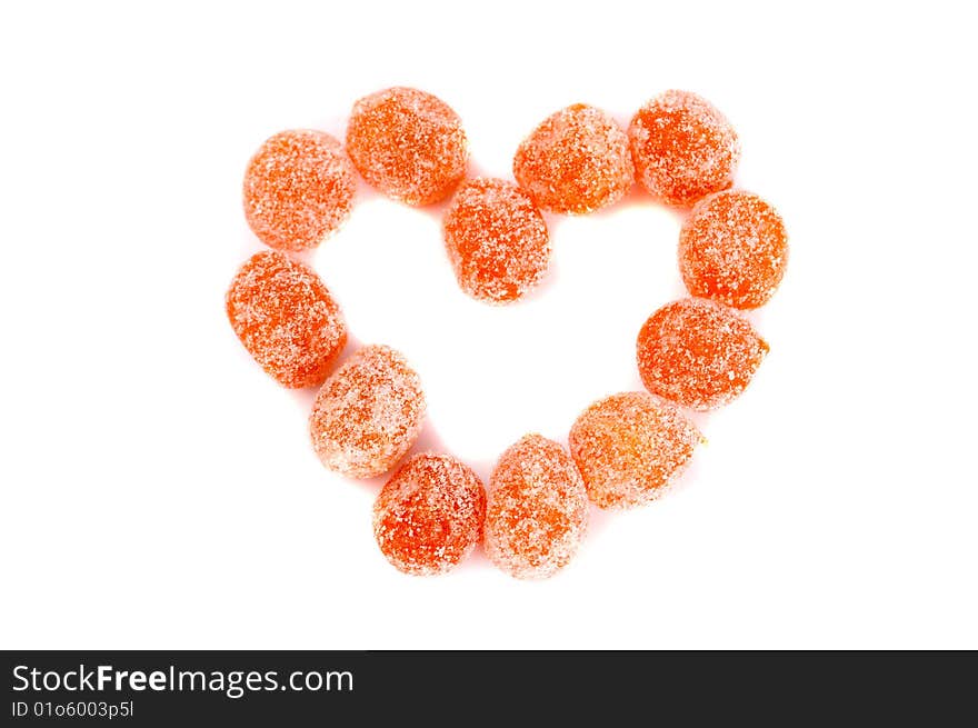 Heart made of orange candies