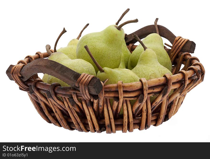 Basket with pears, different pears in a basket against a white background