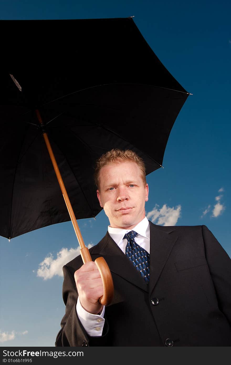 Man Holding Umbrella