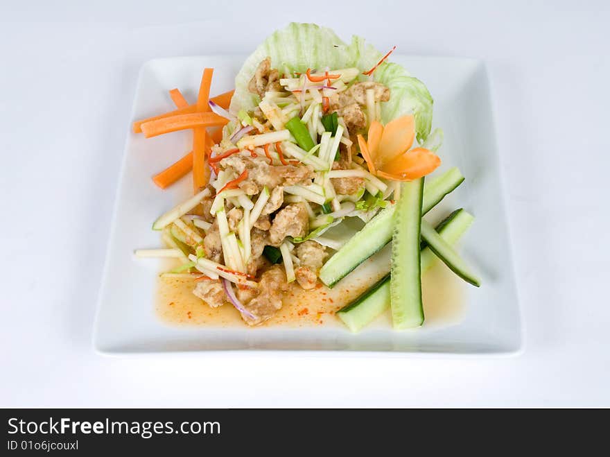 Crispy fried tofu salad with cucumbers and carrots