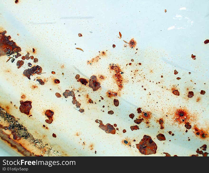 Rust covered lid on a steel drum. Rust covered lid on a steel drum.