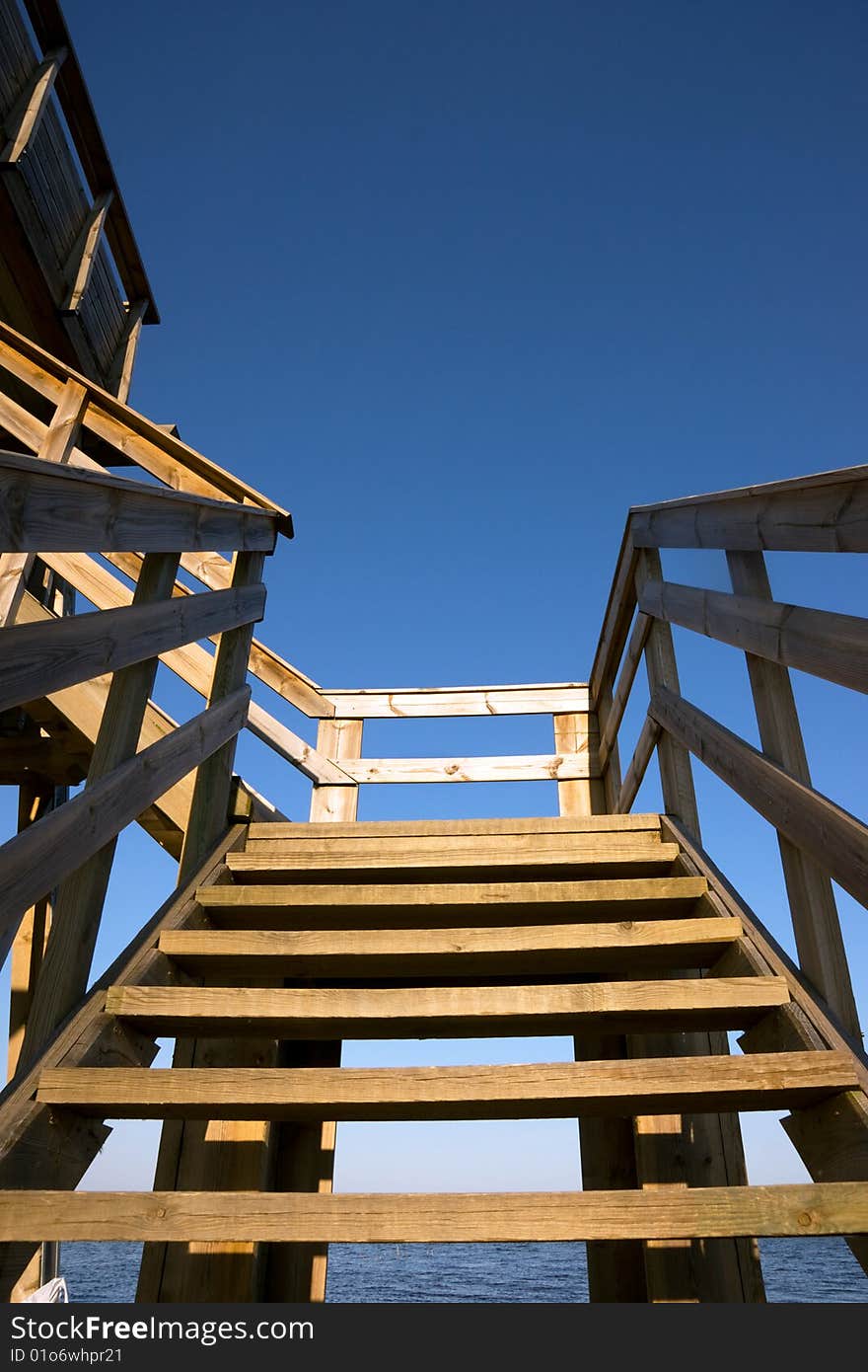 Wooden staircase and blue sky