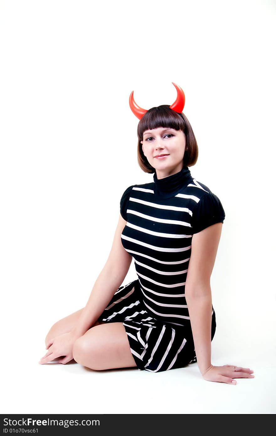 Portrait of a young woman with devilish horns. Portrait of a young woman with devilish horns