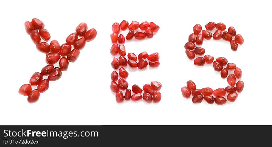 Word yes of red pomegranate letters