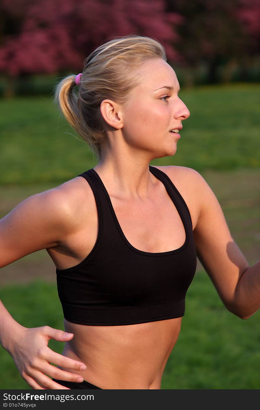 Young fitness woman running outdoor. Young fitness woman running outdoor