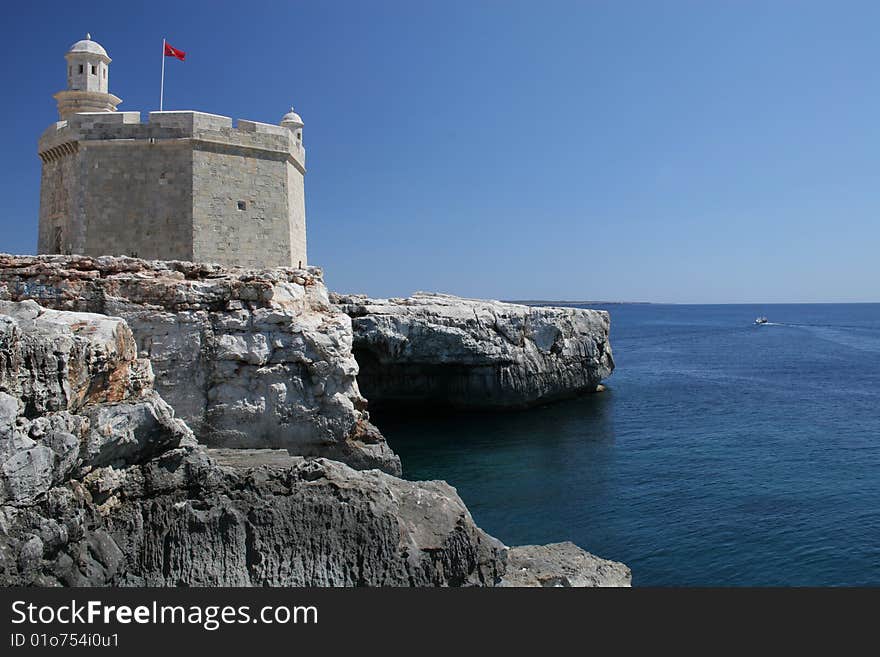 Fortress above a cliff on the Mediterranean coast