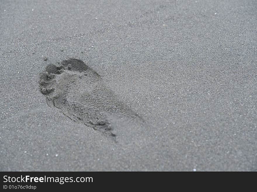 Foot print on the baeach of Japanese sea