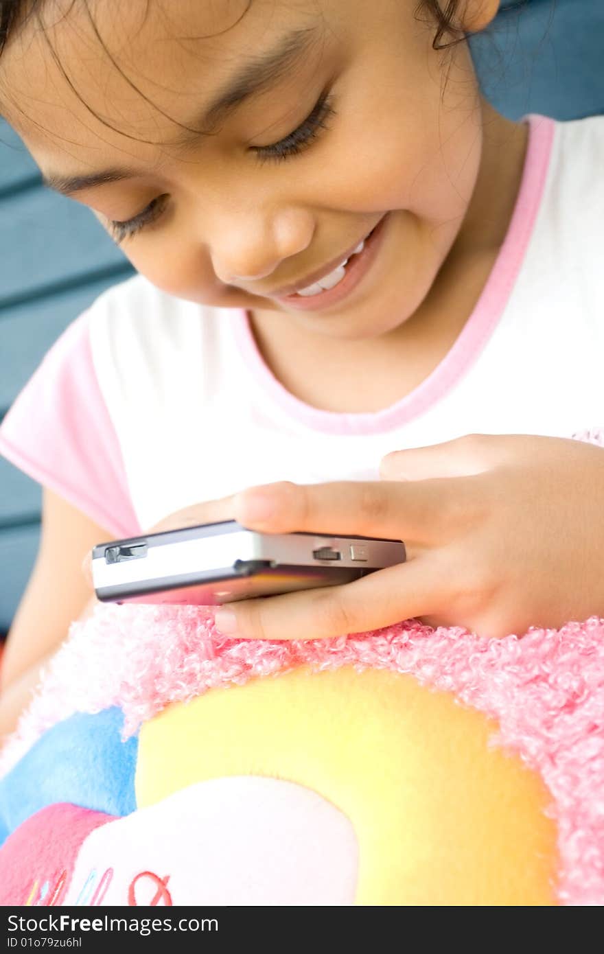 Little girl with cellphone