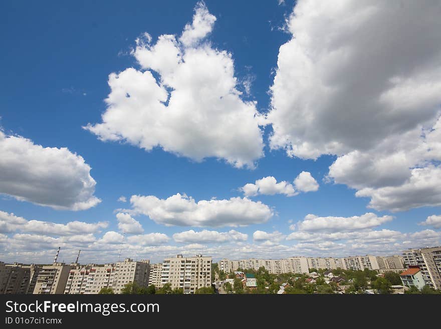 White clouds over the city