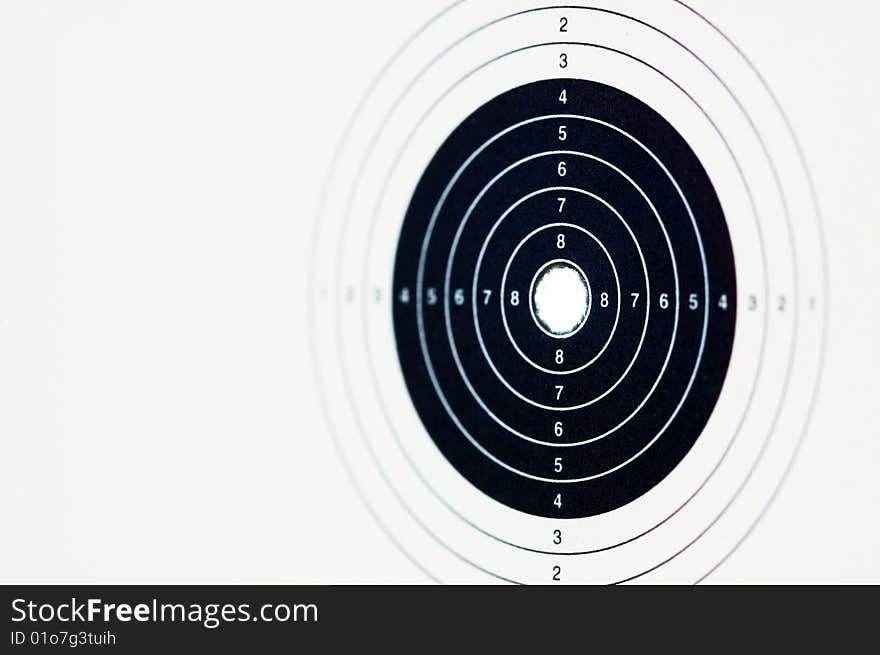 A target with a hit right in the middle. A target with a hit right in the middle