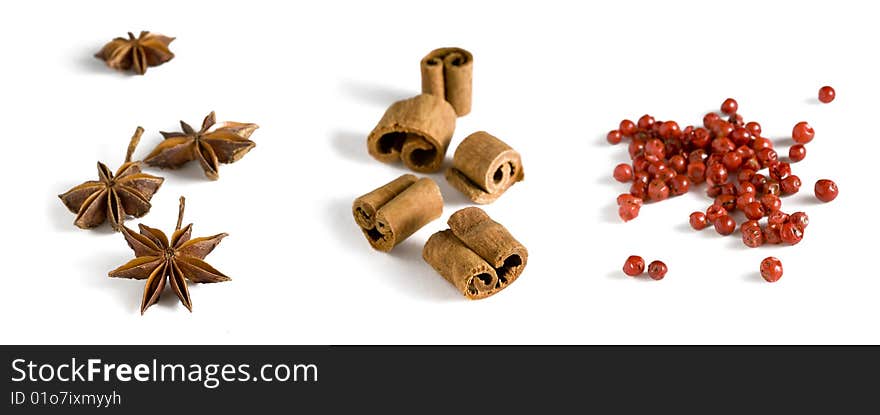 Three different spices with shadows on a white background