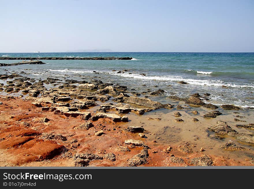 Seascape with red sandstones in Crete, Greece. Seascape with red sandstones in Crete, Greece