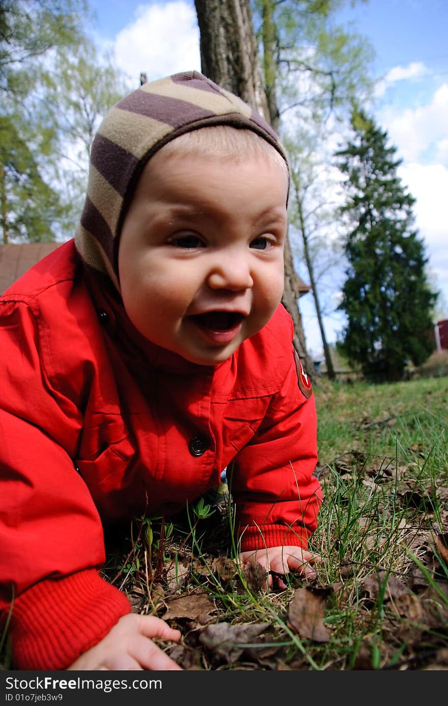 Portrait of adorable baby boy playing on the street. Portrait of adorable baby boy playing on the street