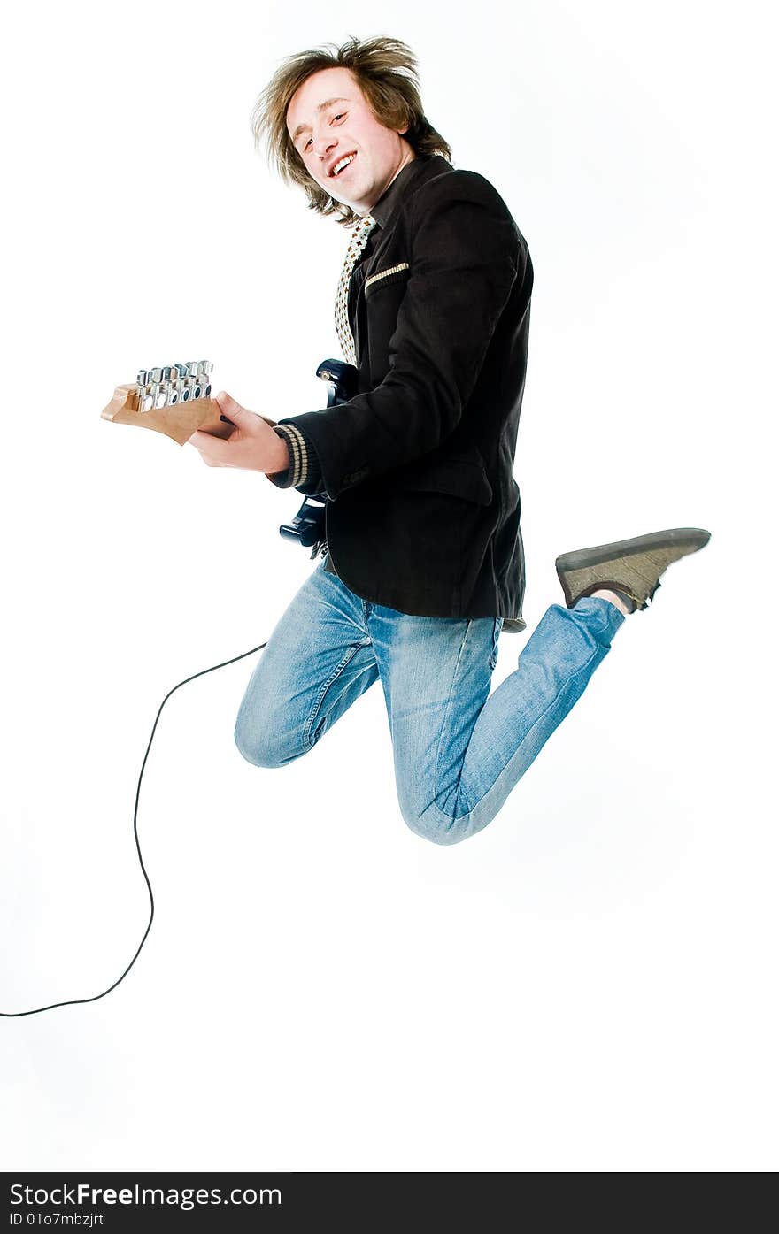 Jumping man with electro guitar, isolated on white background