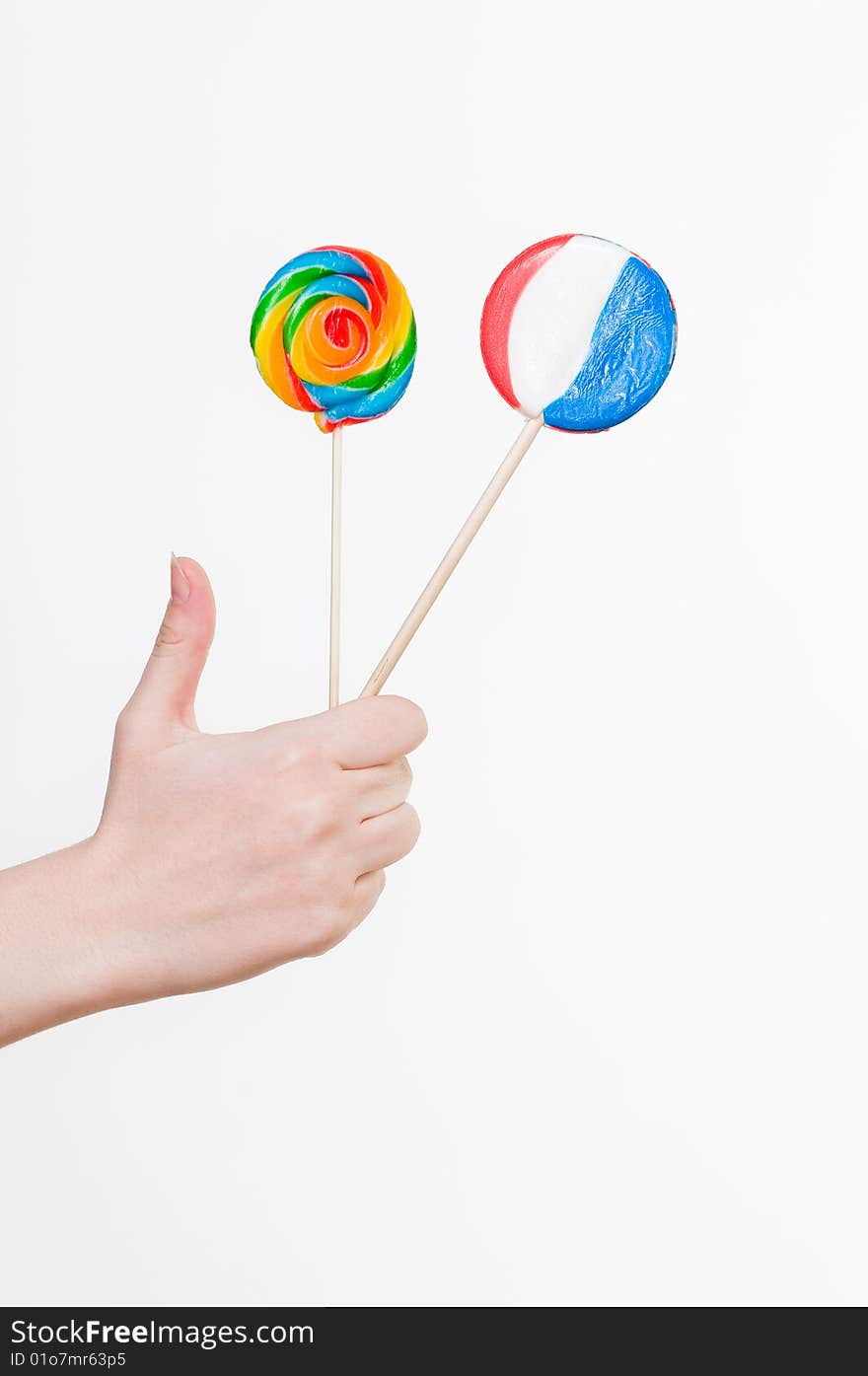 Female hand with lollipops