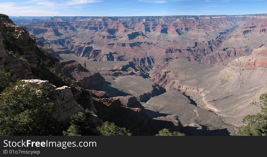 A panorama of the famous Grand Canyon, South Rim.on a beautiful sunny day in April. A panorama of the famous Grand Canyon, South Rim.on a beautiful sunny day in April.