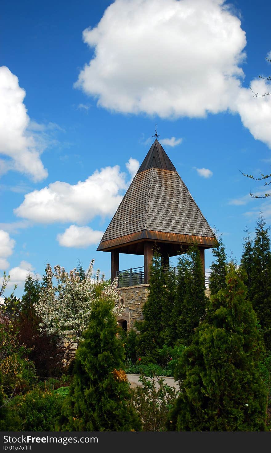 Rose tower against cloudscape and blue skies