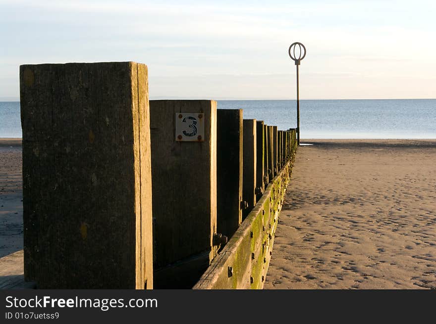 Pillars in a row on a beach. Pillars in a row on a beach