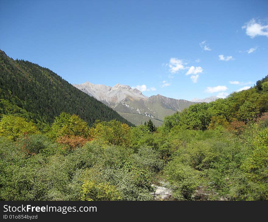 Sky and snow mountains in middle of China