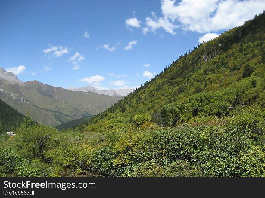 Sky and snow mountains in middle of China