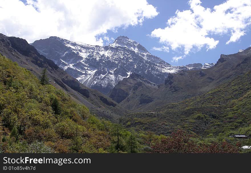 Sky and snow mountains in middle of China