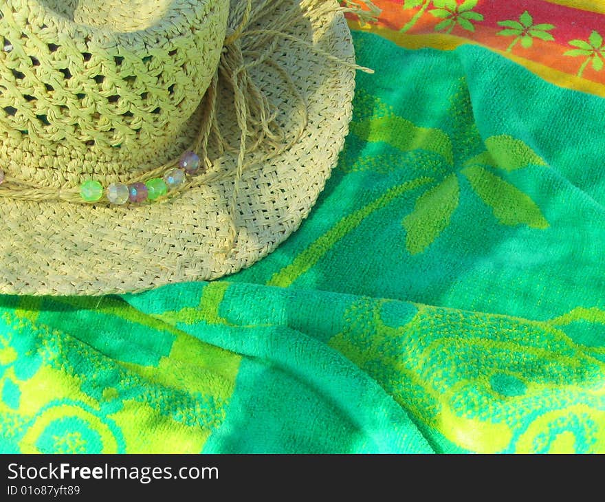 Towel and Hat on the Beach