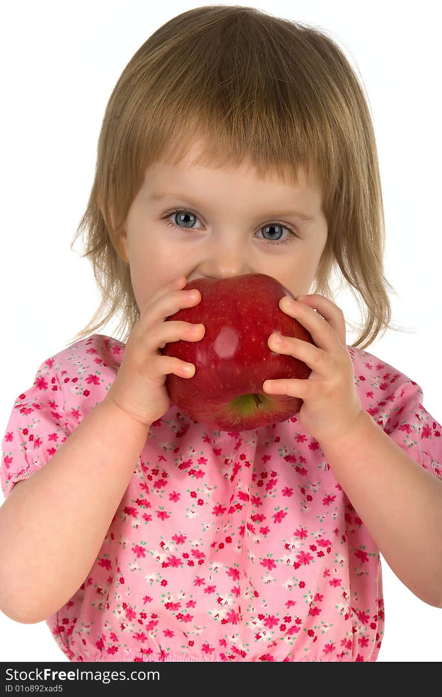 Little girl with red apple isolated on white background